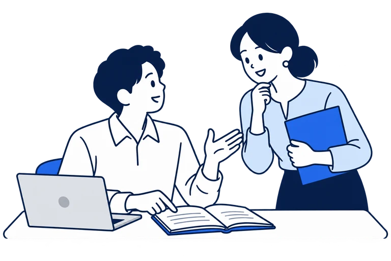 実務の記録を振り返り、次の進め方を共有する二人